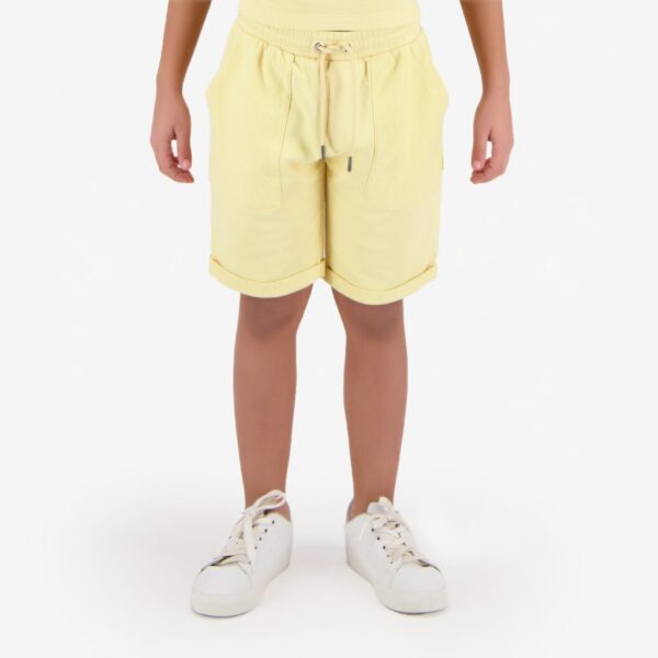 05 010 18 093 K033 6 7A Short garcon avec pochs inversees 6 7A