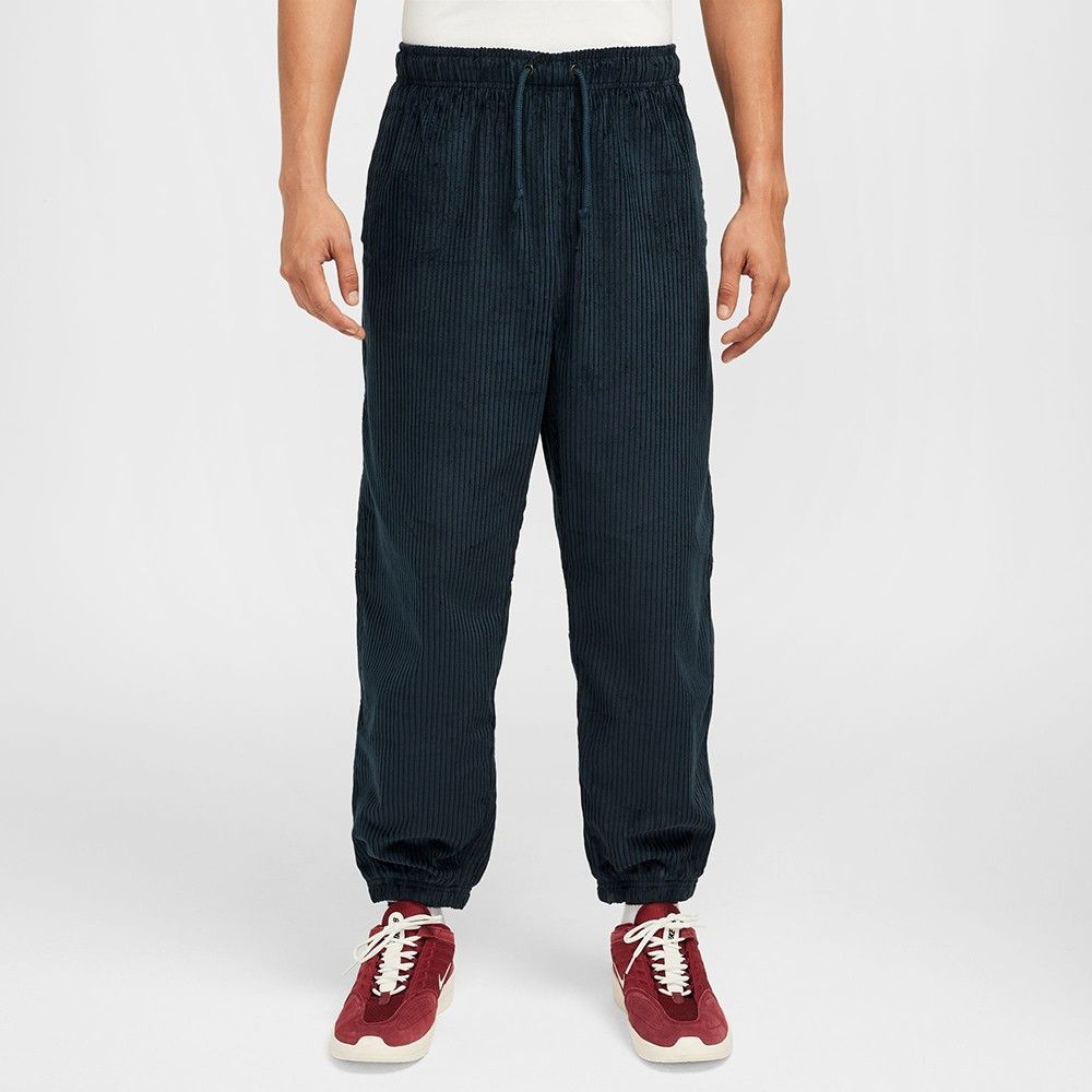 Nike – Nike SB Pantalon de skate en velours côtelé élastique – Bleu marine/Rouge équipe - Nike